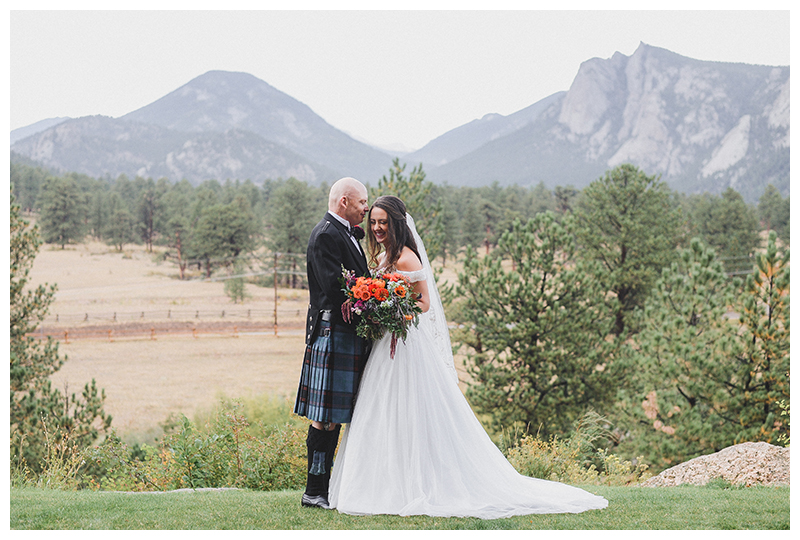 Estes Park Wedding Photographer - Bride and Groom looking over Colorado
