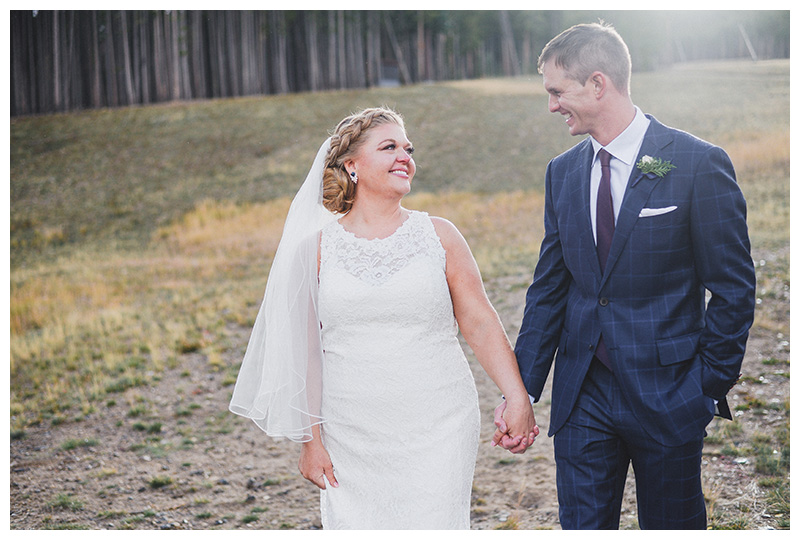 Breckenridge Wedding Photography - Bride and groom smiling at one another