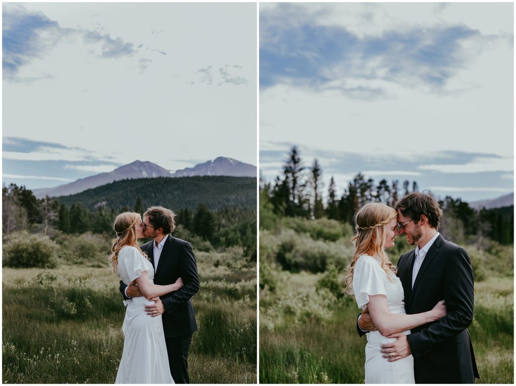 bride and groom on their wedding day in front of Longs Peak 